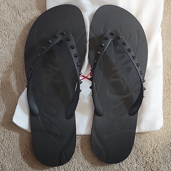 Louboutin spike flip flops